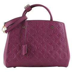 Louis Vuitton Montaigne Handtasche mit Monogramm aus Empreinte Leder MM