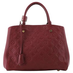 Louis Vuitton Montaigne Handtasche mit Monogramm aus Empreinte Leder MM