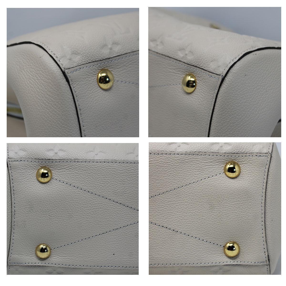 Louis Vuitton Montaigne Neige Empreinte Handbag With Dust Bag 1