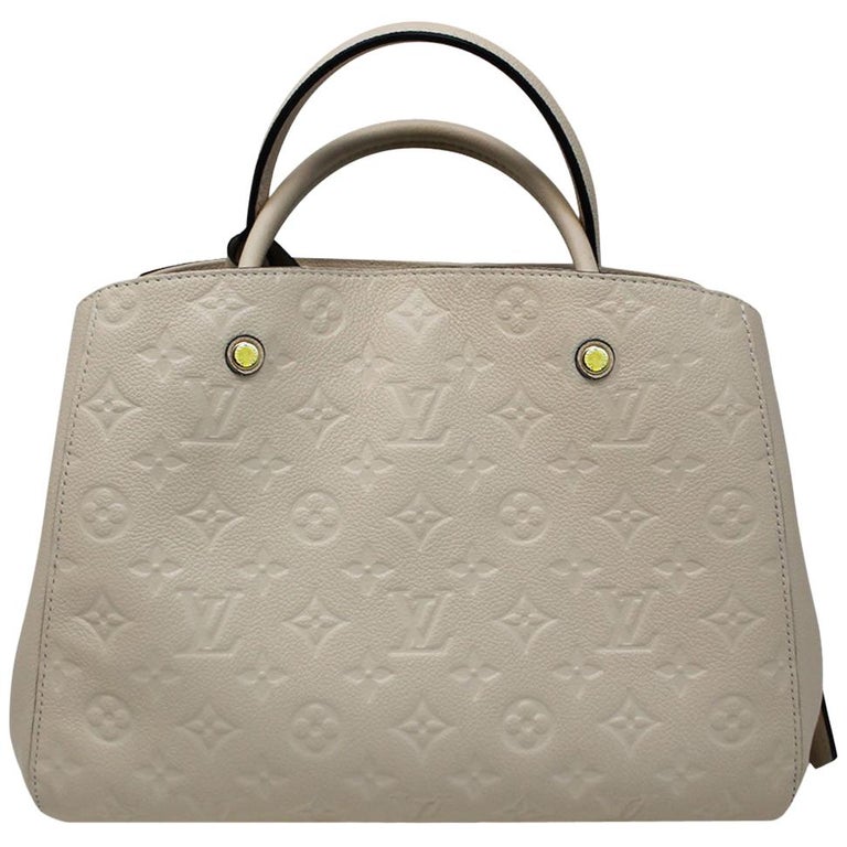 Louis Vuitton Montaigne Neige Empreinte Handbag With Dust Bag at 1stDibs