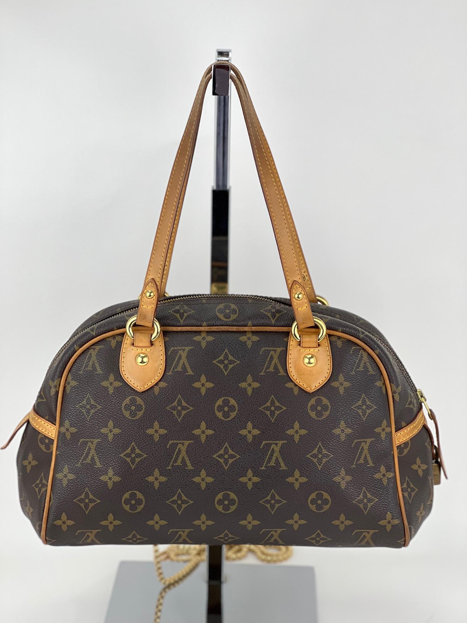 100% Authentic Pre owned
LOUIS VUITTON Monogram Canvas Montorgueil PM Bag
W/added Non LV Strap to carry as a Shoulder Bag
RATING: B/C... Good,, shows some signs of wear and use
LEATHER TRIM:  has some marks and stains
HANDLE: double leather, shows