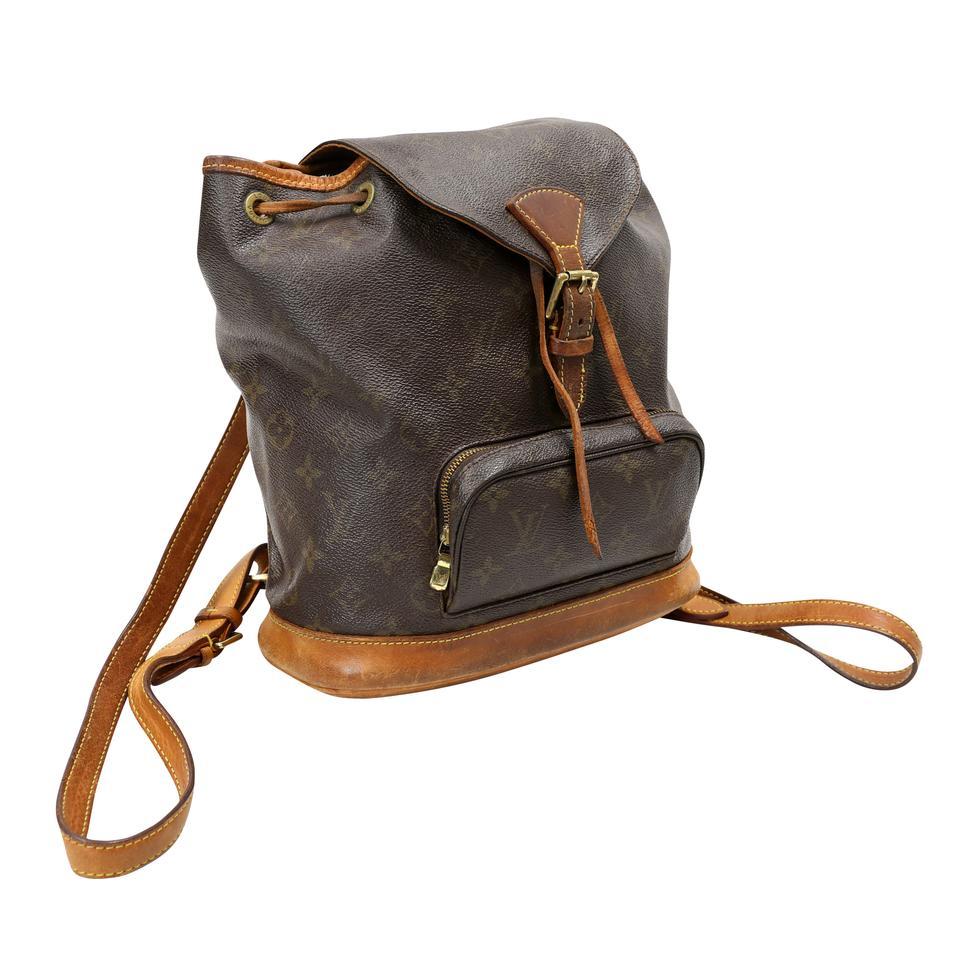 Named after Montsouris Park on the southern edge of France, the Louis Vuitton Montsouris MM Bag is great for ultimate hands-free convenience. It features a spacious compartment that closes with a drawstring and buckled flap for added security. The