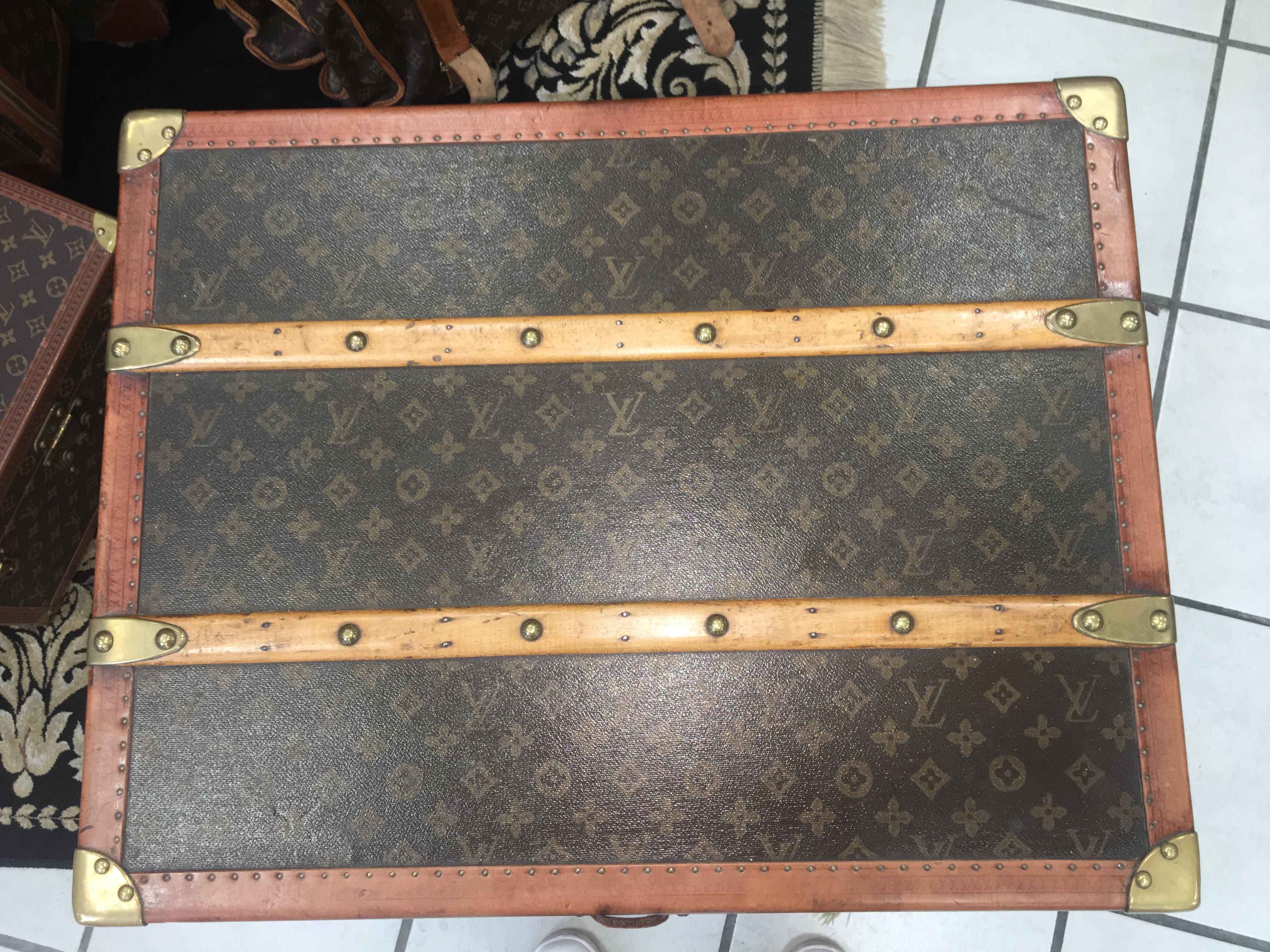 Authentic Louis Vuitton Wardrobe Trunk,  features monogram canvas, all brass hardware, and leather trim. 
A very rare and top of the line model.
Original owner initials and city on sides: 