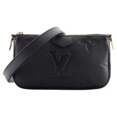 LV x YK Multi Pochette Accessoires​ Monogram Empreinte Leather - Handbags