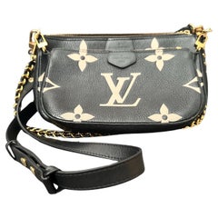 Louis Vuitton Multi Pochette Accessoires Monogram Implant Leather Bag