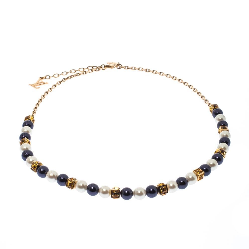 This necklace from Louis Vuitton is sure to catch an eye and make your heart skip a beat. The necklace is crafted from gold-tone metal strung with faux pearls and crystal-embellished motifs, and held by a lobster clasp. Flaunt it with your dresses