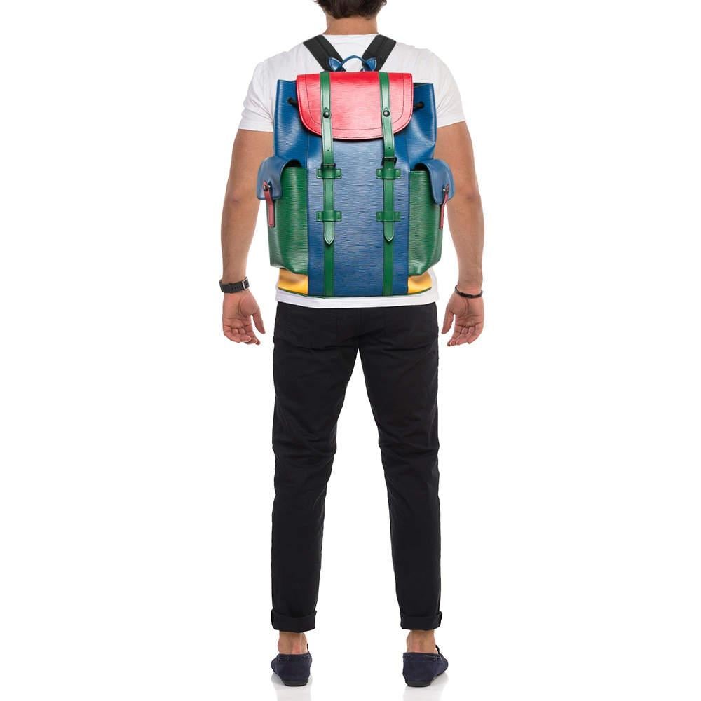 This luxe backpack from Louis Vuitton brings you the most convenient way to carry your belongings safely. Created using Epi leather it features additional pockets and a roomy fabric interior. Make a great addition to your closet with this multicolor