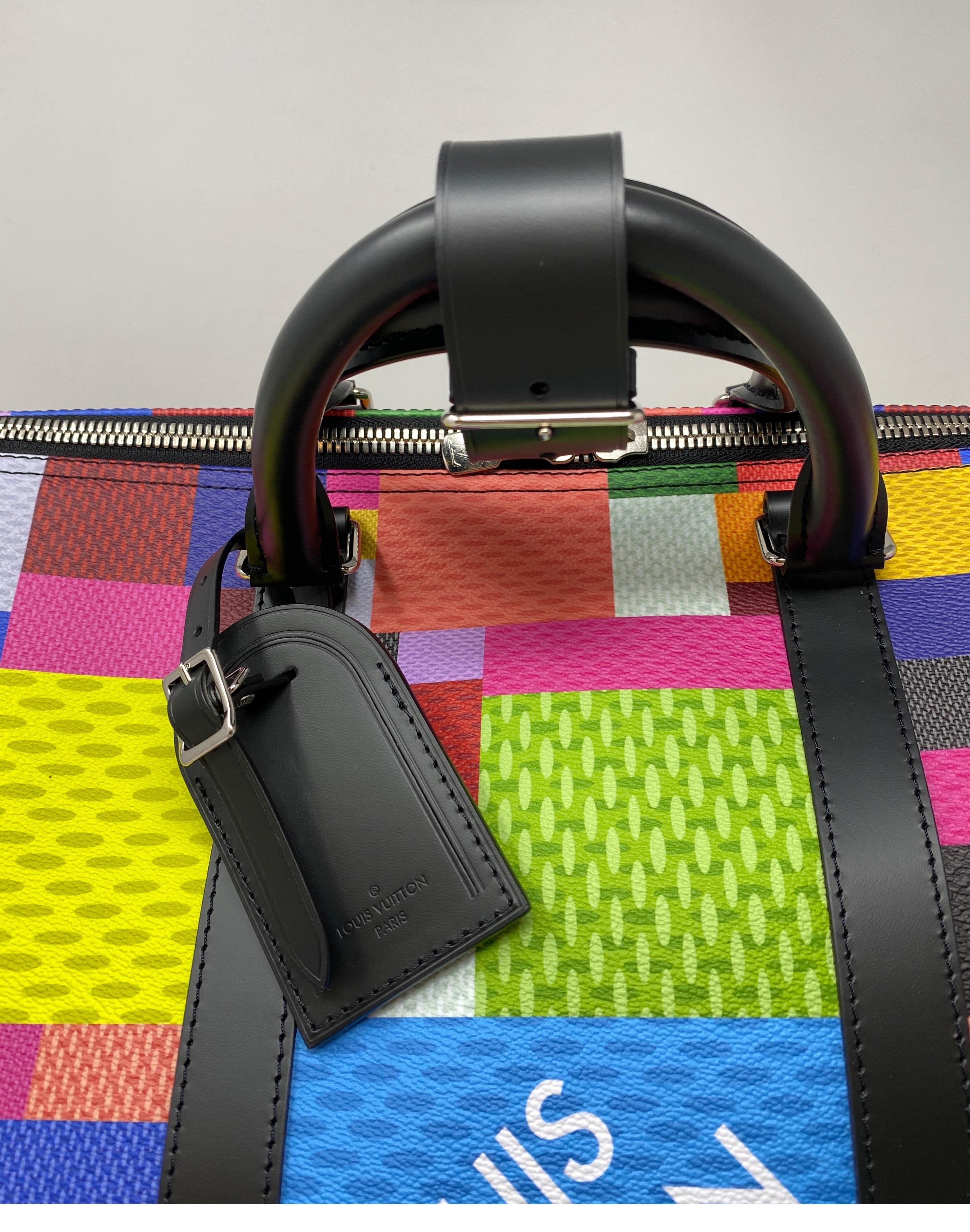 Louis Vuitton Multicolor Keepall 50 Bandouliere. Patchwork style design. Unique art style bag. Mint like new condition. Collector's piece. Includes strap, ID luggage, lock, and keys. Guaranteed authentic. 