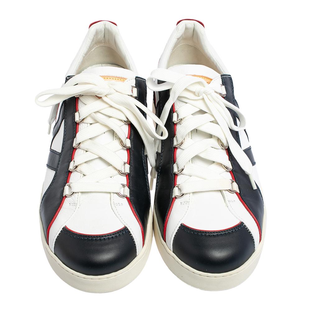 Ace the sneakers game in these fabulous sneakers from Louis Vuitton! These multicolor sneakers are crafted from leather and feature a low-top silhouette with lace-up vamps and round toes. They come equipped with comfortable leather-lined insoles and