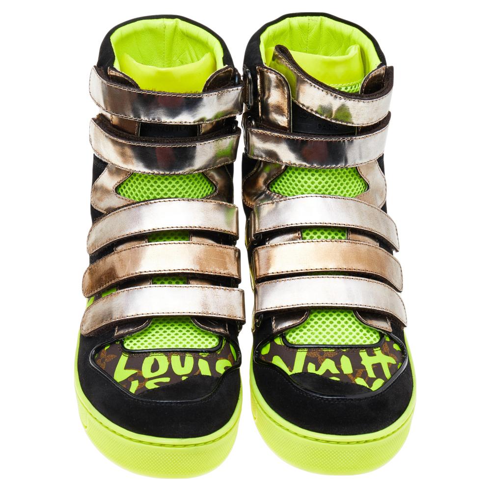 Get super funky with these sneakers by Louis Vuitton! Crafted from carefully put together suede and leather, they feature cool neon graffiti detail in Stephen Sprouse style combined with straps on the vamps and high tops. The insoles are