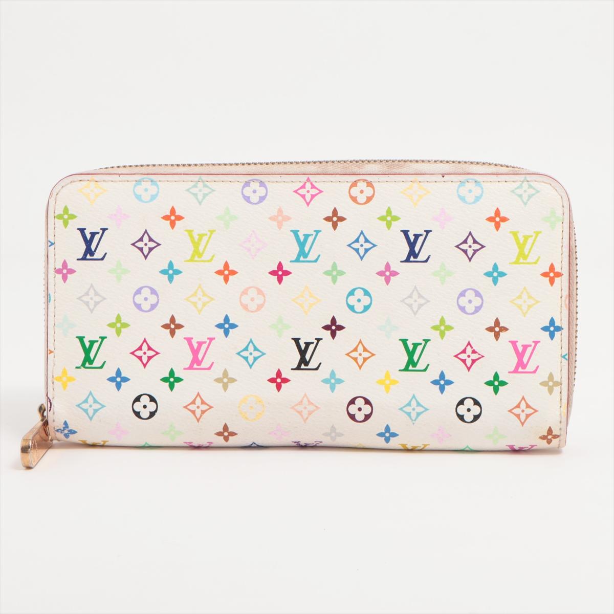The Louis Vuitton Multicolor Zippy Wallet a vibrant and iconic accessory that seamlessly blends luxury with a playful aesthetic. The wallet features signature Multicolor monogram canvas designed by Takashi Murakami, showcasing a lively and colorful