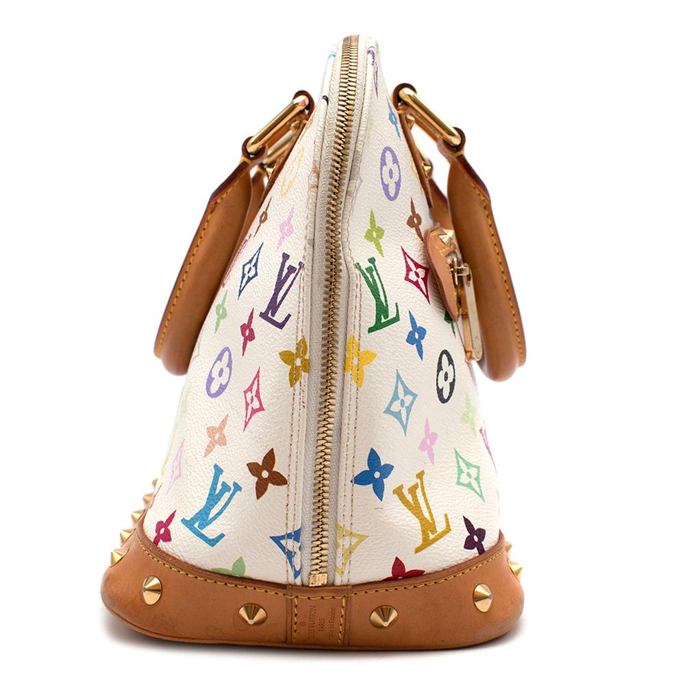Louis Vuitton Monogram Multi-coloured Alma Bag 2003

- Multi-coloured collection from 2003 featuring gold studs around the bottom of the bag, base of the handles and the zip panel

- Yellow top stitching around the tanned leather

- Burgundy lining