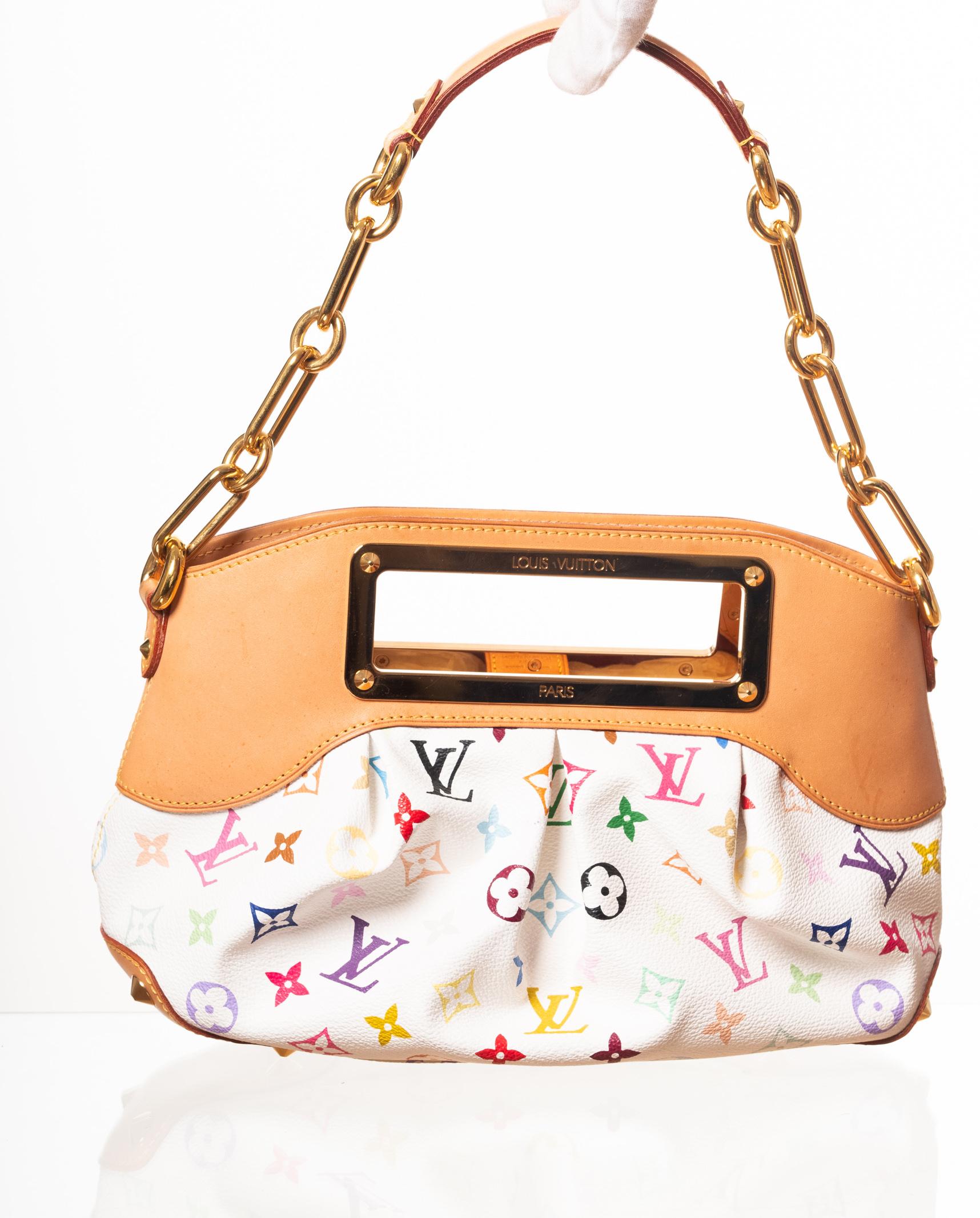 From the Takashi Murakami Collection. This style is made of white canvas with multicolour monogram. Featuring brass hardware, natural leather finishes, cut out handles, chain shoulder strap, top snap closure, bottom studs and alcantara interior