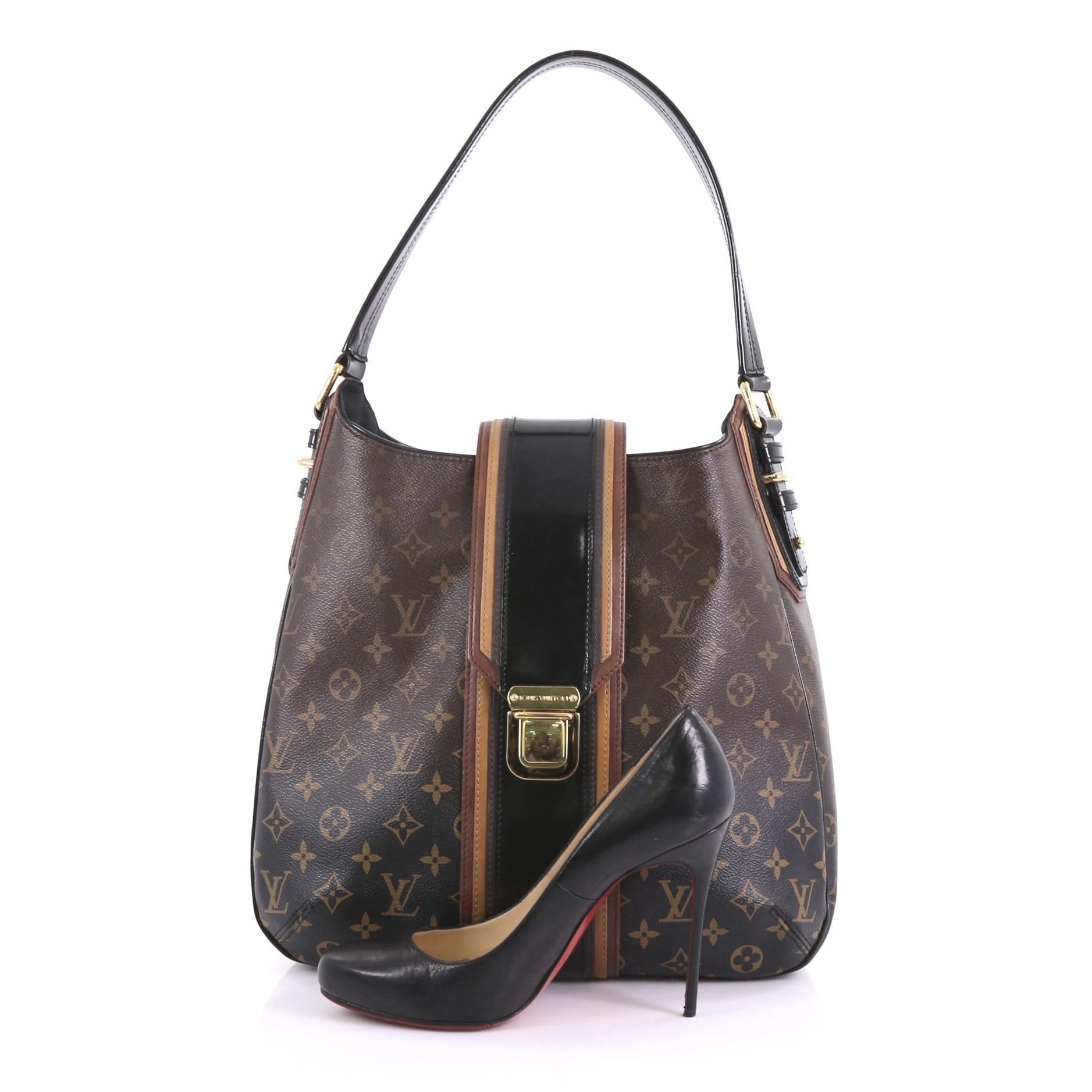 This Louis Vuitton Musette Handbag Limited Edition Monogram Mirage, crafted in brown monogram coated canvas, features patent leather handle and trim, protective base studs, and gold-tone hardware. Its push-lock closure opens to a black microfiber