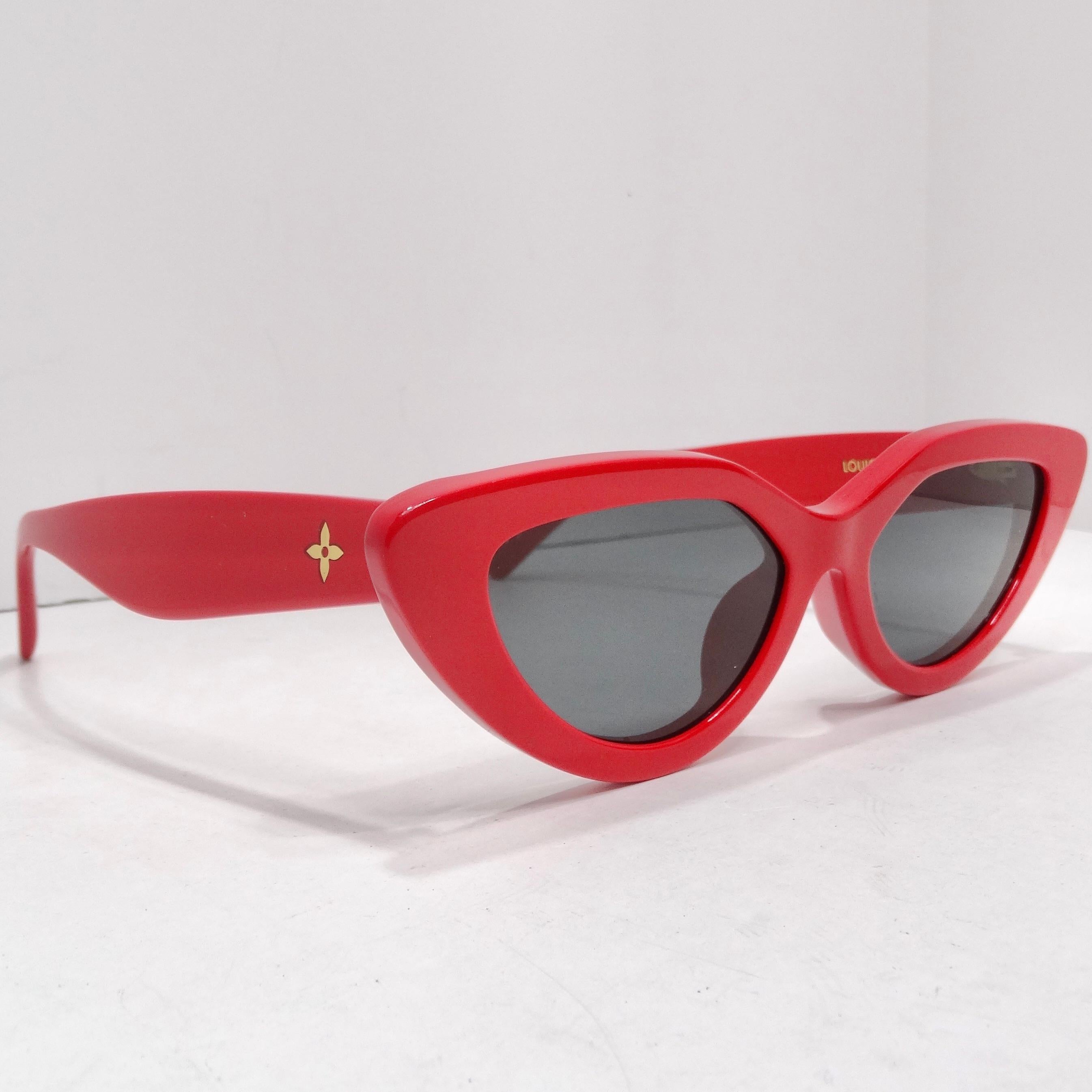 Get your hands on the Louis Vuitton My LV Cat Eye Sunglasses in Red – a bold and stylish accessory that effortlessly combines luxury and fashion-forward design. Elevate your eyewear collection with these statement sunglasses featuring red cat-eye