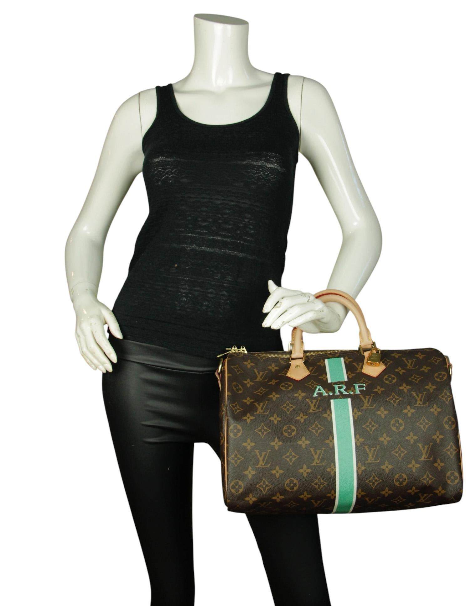 Louis Vuitton My LV Heritage Speedy Bandouliere 35 Bag. Features 