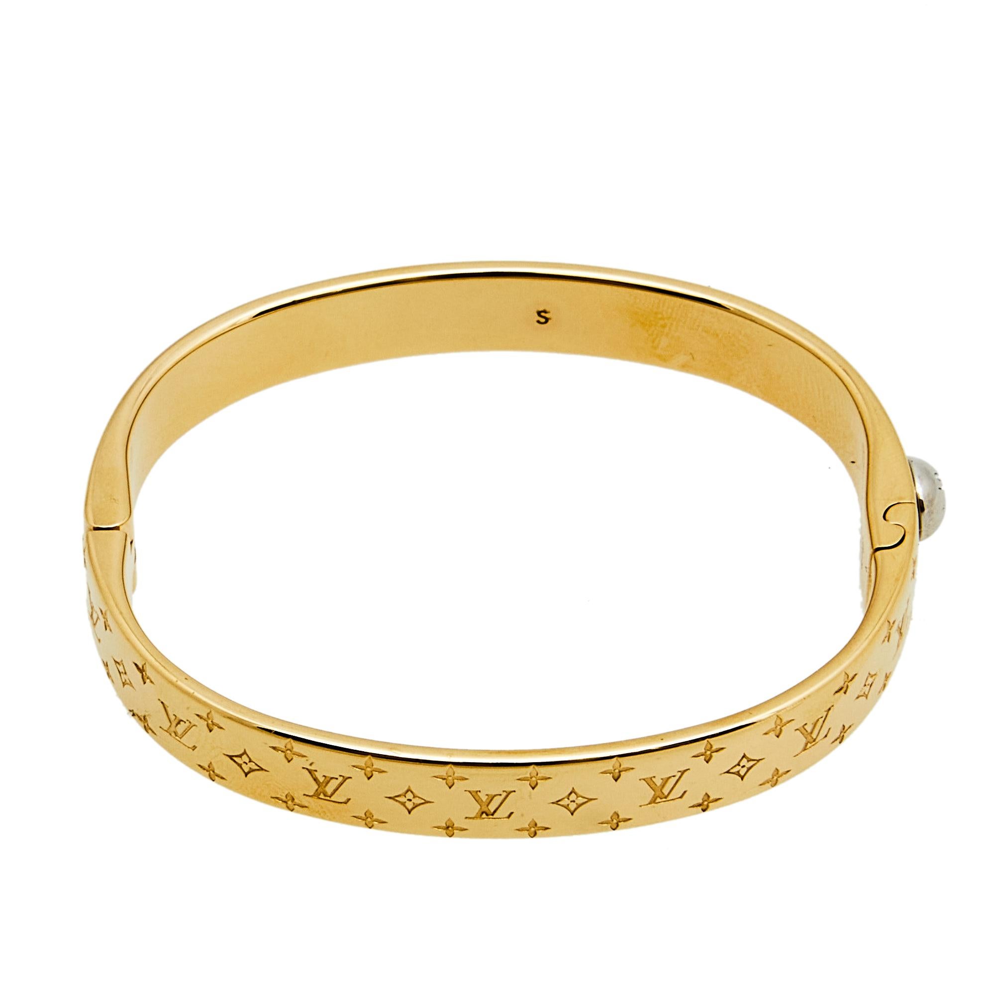 Bound to sit around your wrist and exude beauty, this Louis Vuitton creation is a great buy. It is made from gold-toned metal and engraved with its signature motifs, a pattern well-known and loved by fashion lovers around the world. The bracelet has