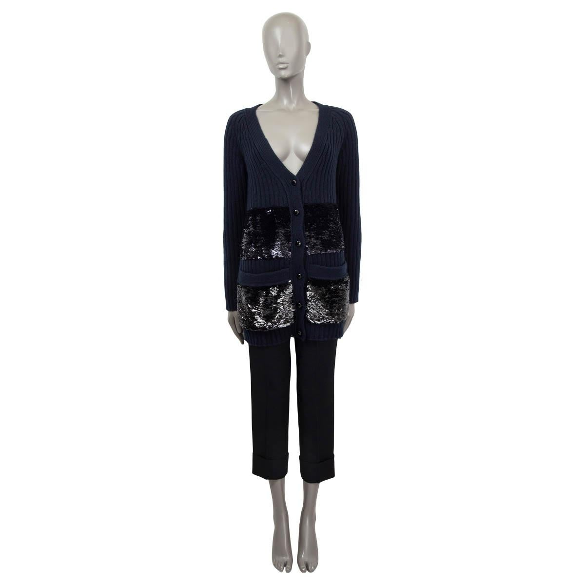 100% authentic PLouis Vuitton long cardigan in blue and black cashmere (100%). Features black sequin embellished front pockets. Closes on the front with buttons. Has been worn and is in excellent condition.

Measurements
Tag Size	S
Size	S
Shoulder