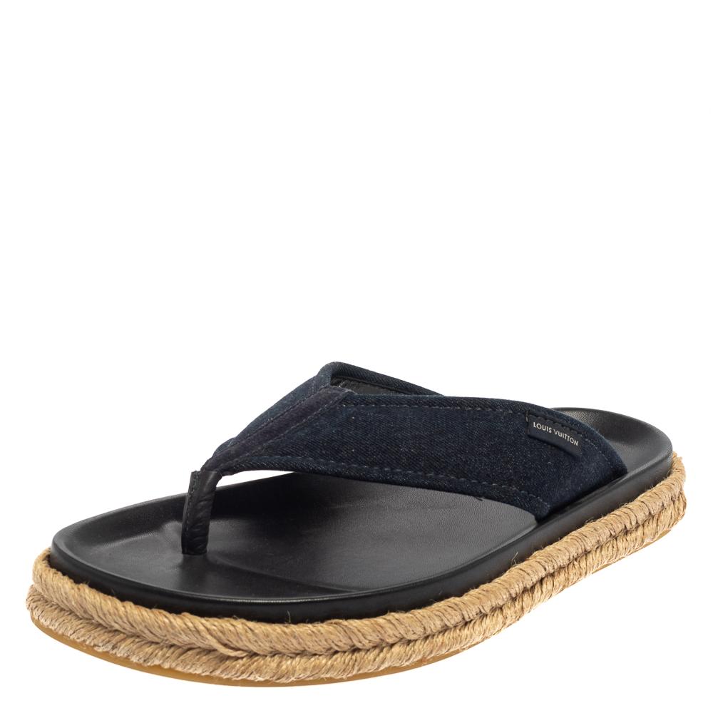 A pair of thong sandals is a must in every footwear collection and when the design is by Louis Vuitton, it is sure to add a luxurious statement to your summer style. These flats are crafted from denim, lined with leather, and set on espadrille