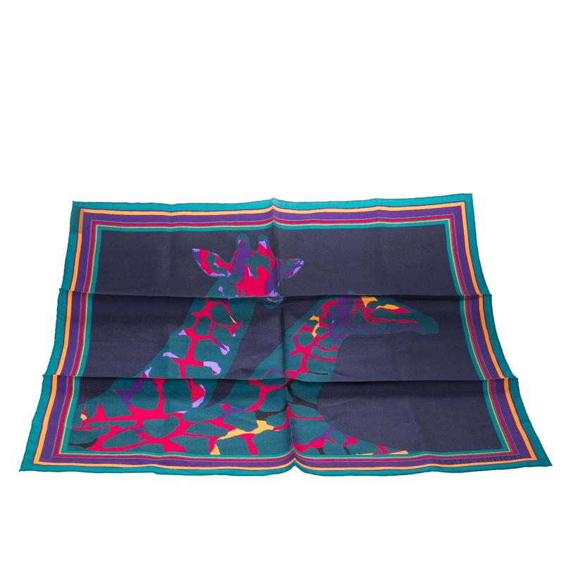 Isn't this square scarf from Louis Vuitton just amazing! Beautifully cut from silk, the navy blue scarf carries a design of bold borders including two giraffes and you can style this piece in many ways.

Includes: The Luxury Closet Packaging

