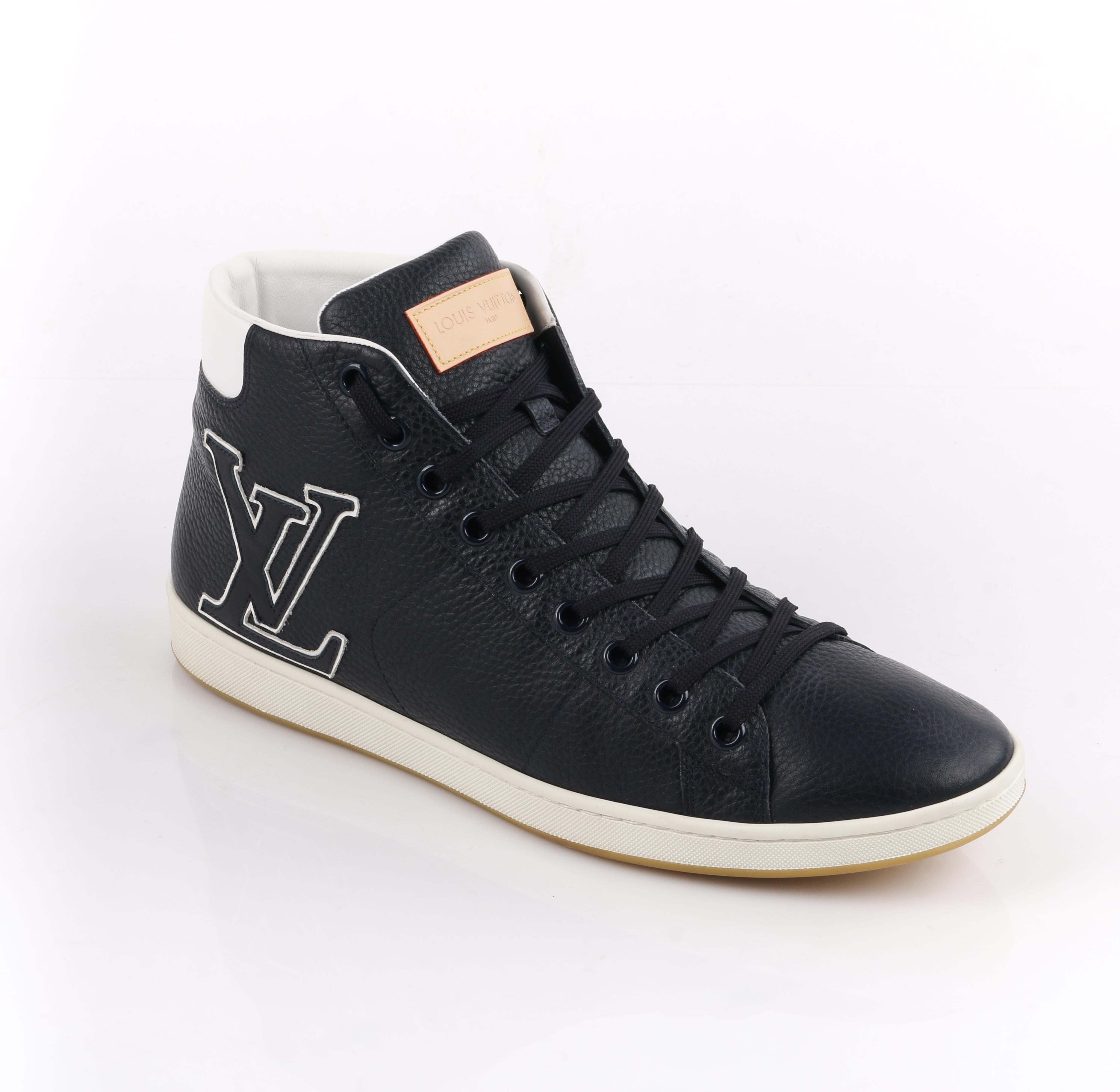 DESCRIPTION: LOUIS VUITTON Navy Blue Leather Tattoo LV Logo Monogram High Top Sneakers  
 
Brand / Manufacturer: Louis Vuitton
Style: High Top Sneaker
Color(s): Navy Blue and white
Lined: Yes
Marked Fabric Content: Upper and lining: leather; sole: