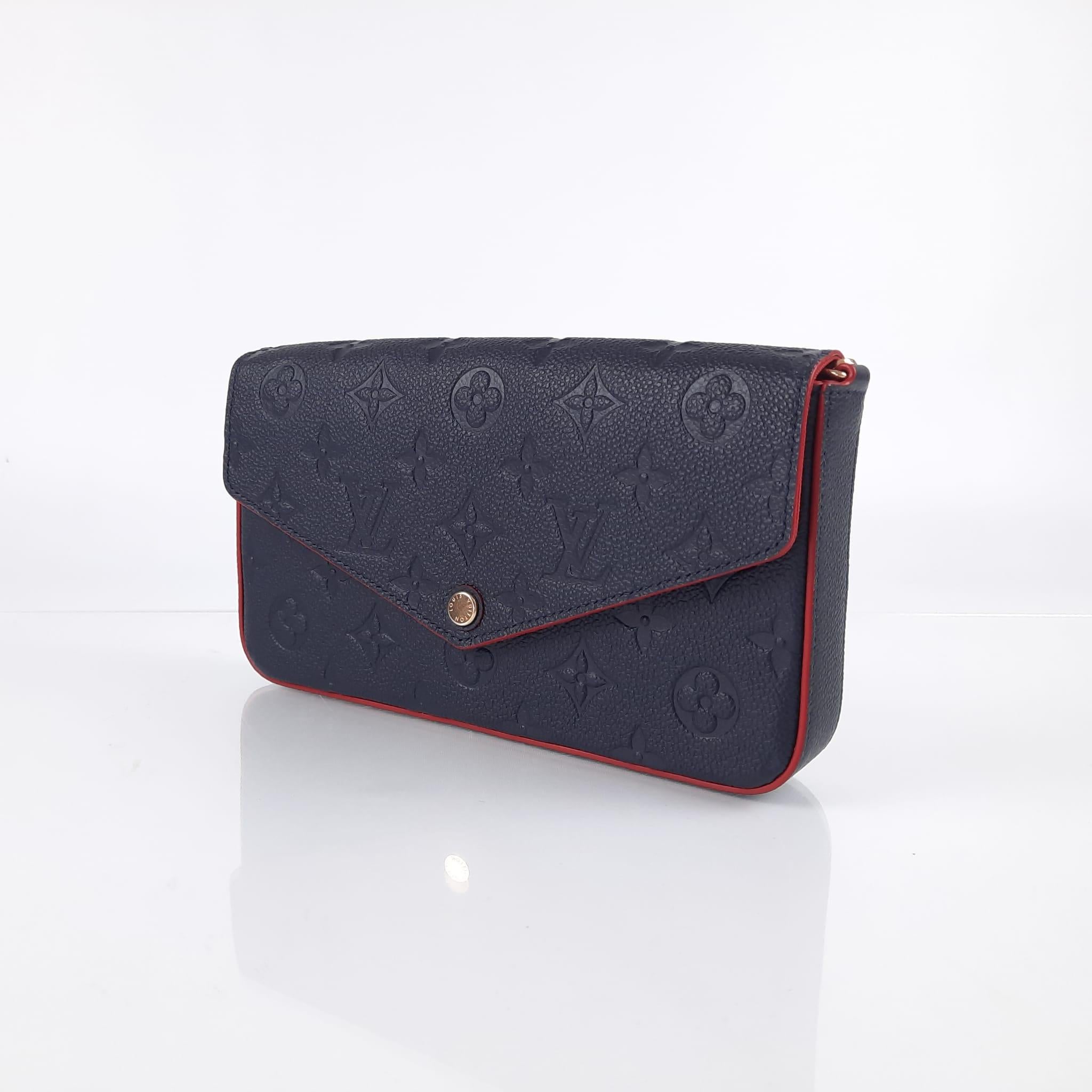Navy Blue/Red
Monogram Empreinte embossed supple grained cowhide leather
Supple grained cowhide leather trim
Textile lining
Gold-colour hardware
Press stud closure
Large compartment
Removable zipped pocket
Removable flat pocket with 8 card