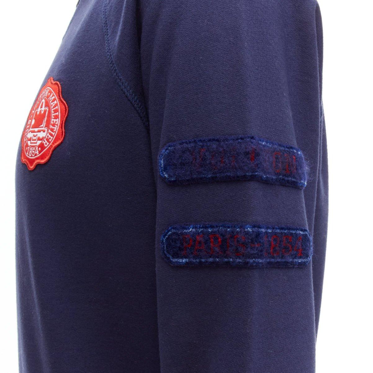 LOUIS VUITTON navy cotton blend red malletier badge web ribbed sweater L
Reference: JSLE/A00034
Brand: Louis Vuitton
Material: Cotton, Blend
Color: Navy, Red
Pattern: Solid
Closure: Pullover
Made in: Italy

CONDITION:
Condition: Very good, this item