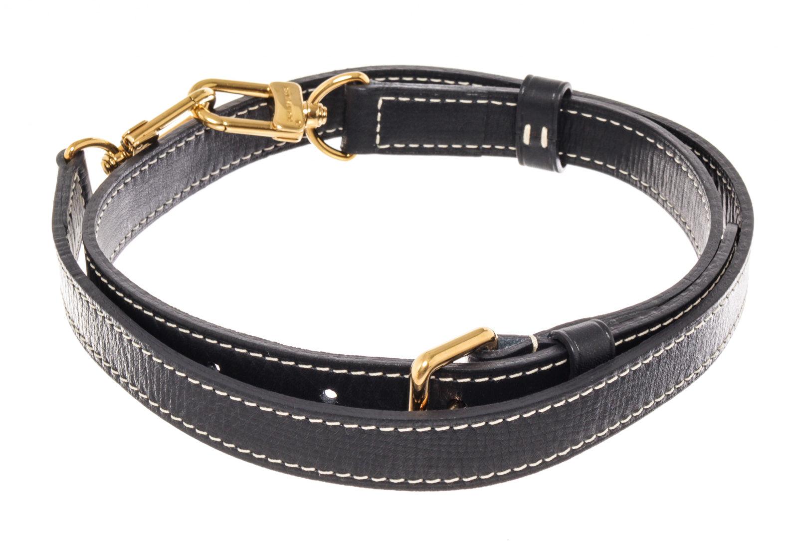 Louis Vuitton Navy Leather Extender Strap with leather, tan vachetta leather, turn lock closure.
61204MSC