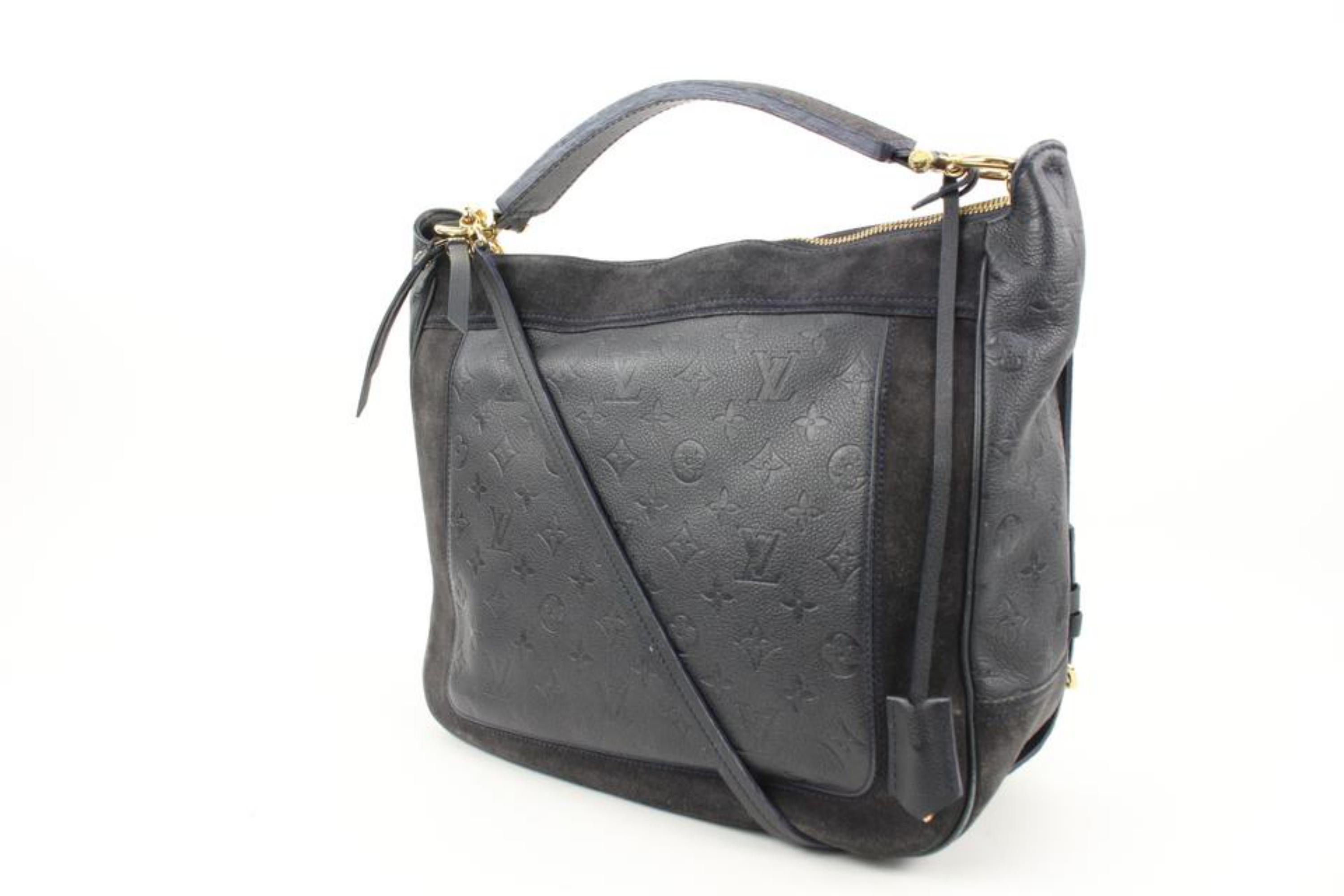 Louis Vuitton Navy Monogram Leather Empreinte Audacieuse PM 2way Hobo Artsy 24lv127s
Date Code/Serial Number: AR4111
Made In: France
Measurements: Length:  16.5
