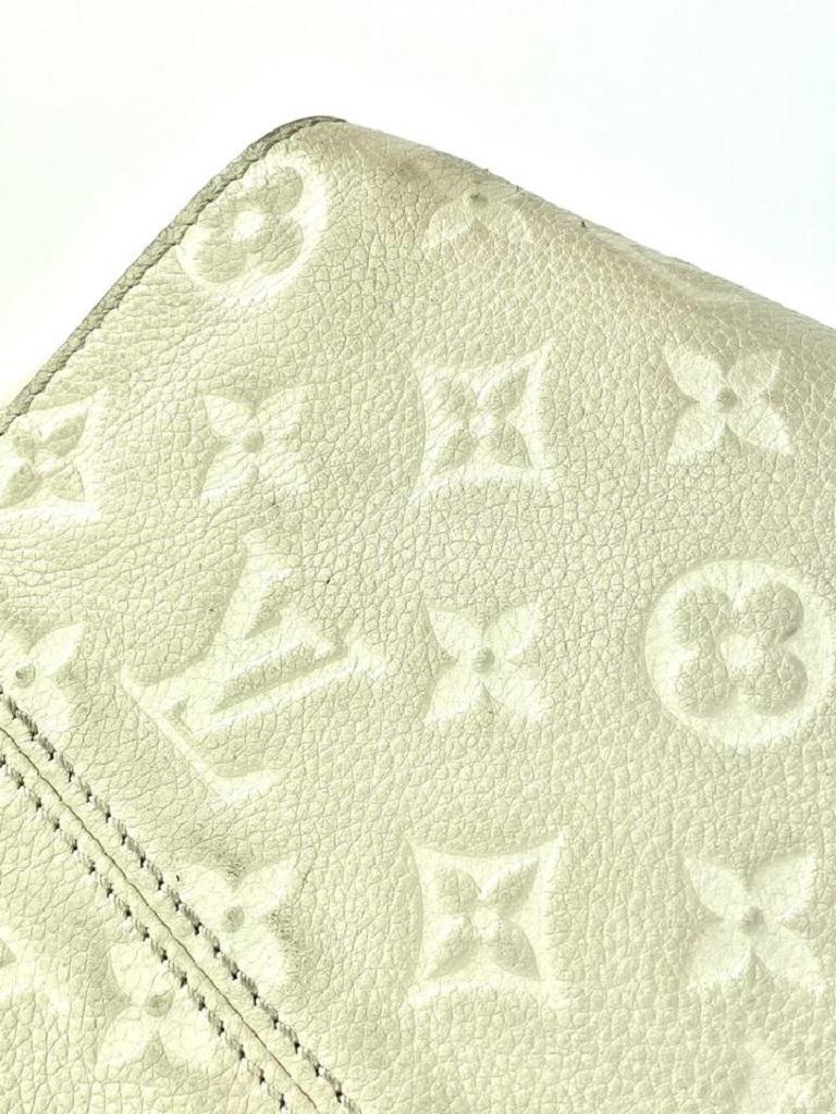 Louis Vuitton Neige Ivoire Empreinte Cuir Lumineuse PM 2way Bag 29LV713 en vente 5