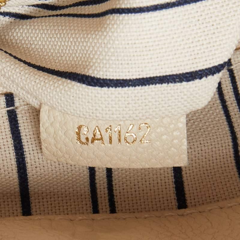Louis Vuitton Neige Monogram Empreinte Leather Artsy MM Bag 8