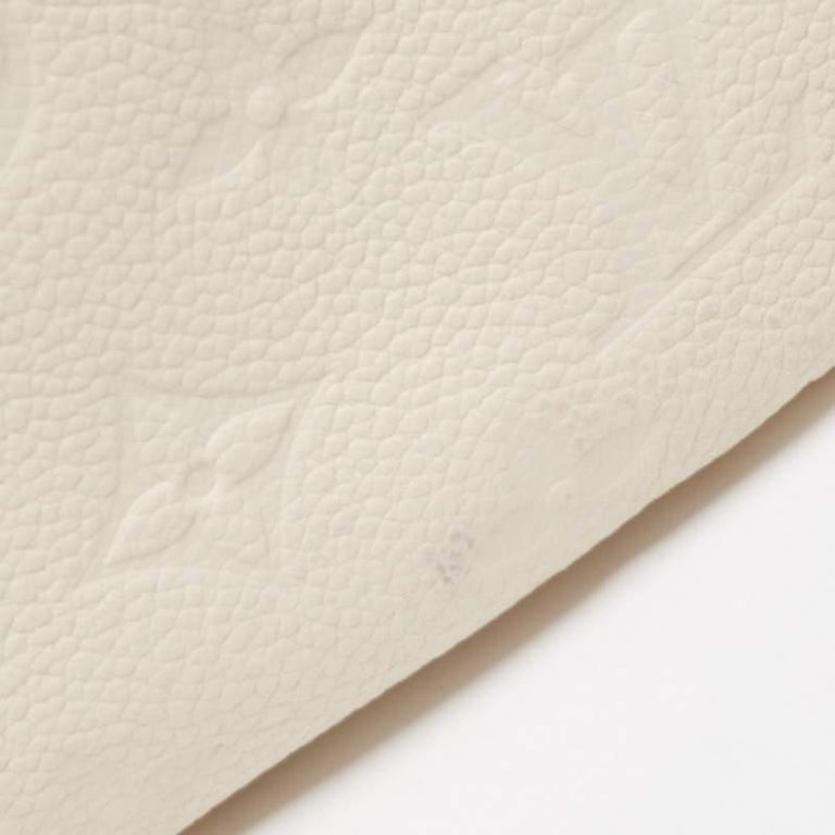 Louis Vuitton Neige Monogram Empreinte Leather Artsy MM Bag at 1stDibs