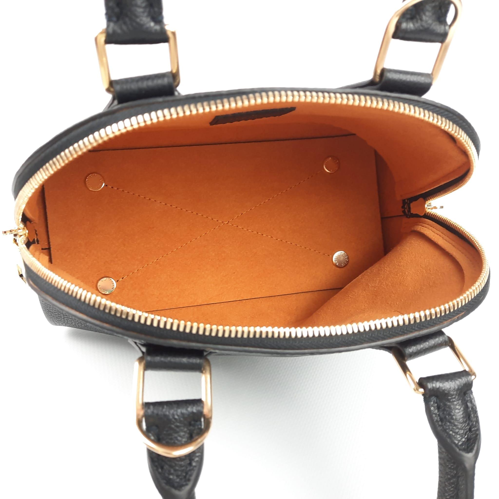 Louis Vuitton Néo Alma BB Monogram Empreinte Leather Black For Sale at 1stDibs neo alma bb