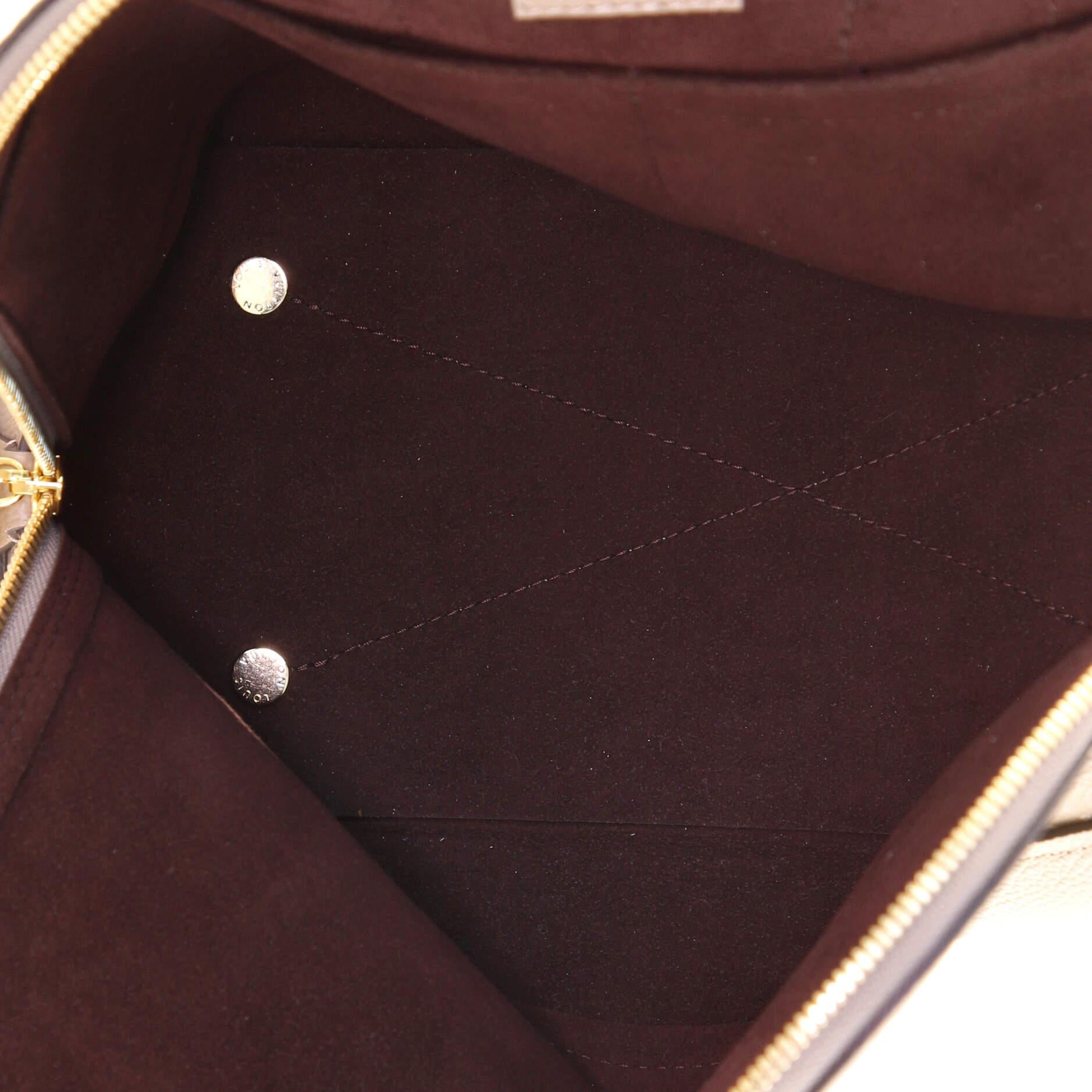 Louis Vuitton Neo Alma Handbag Monogram Empreinte Leather PM In Good Condition In NY, NY
