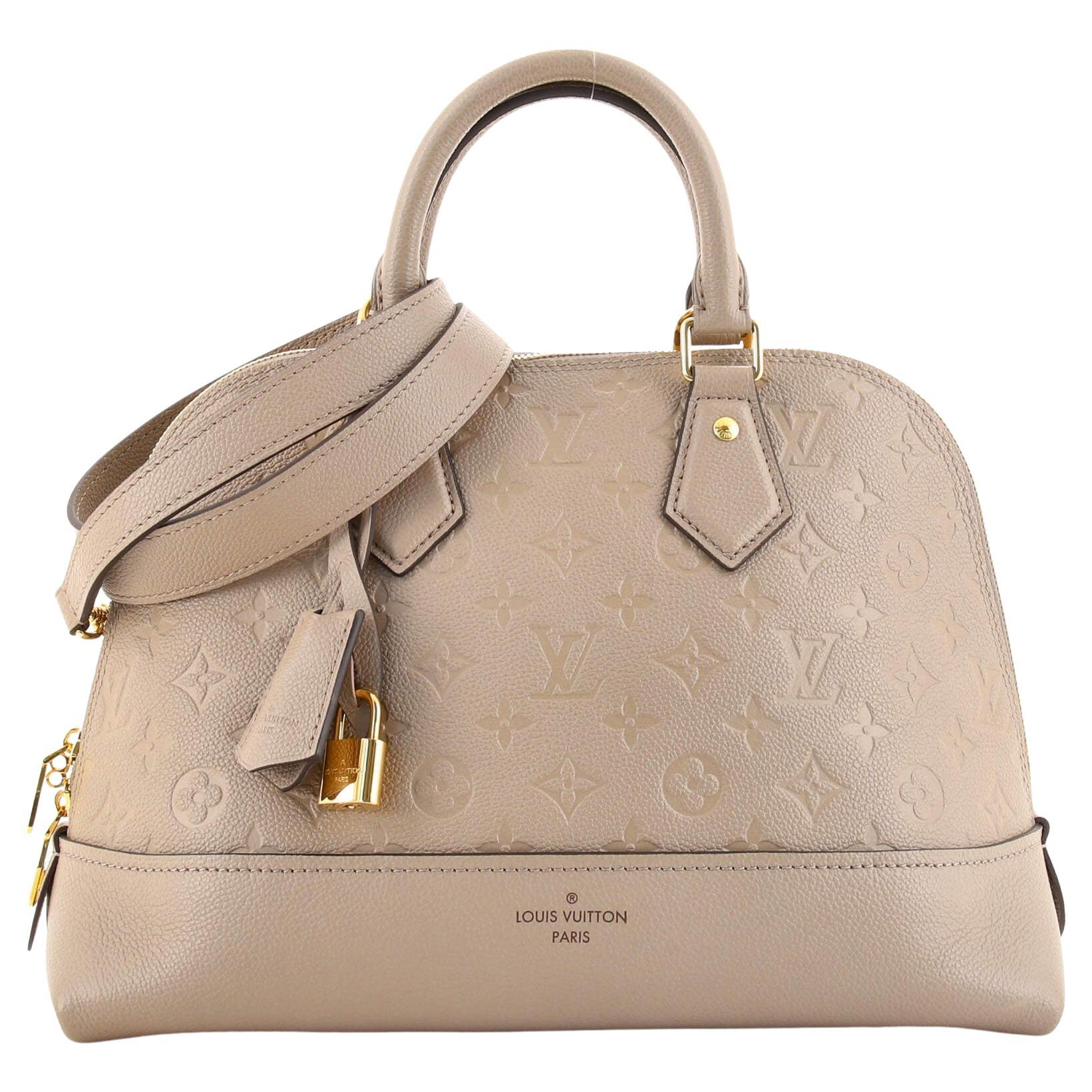 Louis Vuitton Alma PM Handbag with key clochette at 1stDibs  louis vuitton  clochette for sale, alma bb clochette, lv clochette