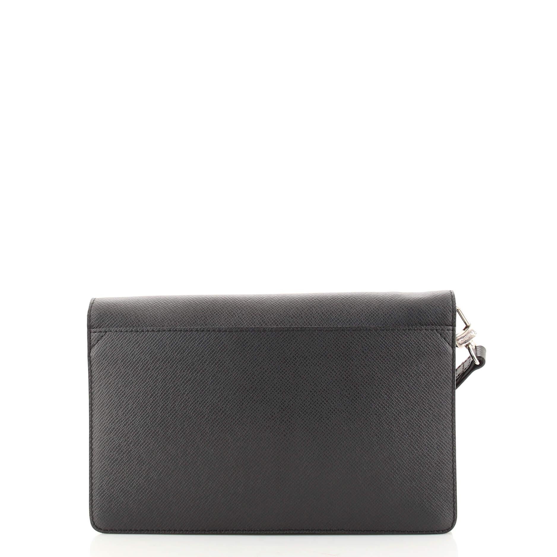 Louis Vuitton Neo Belaia Clutch Taiga Leather In Good Condition In NY, NY