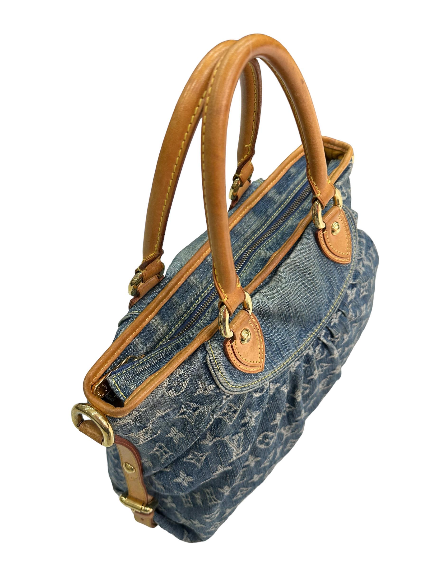 Louis Vuitton bag, Neo Cabby model, size GM, made of denim in the classic monogram pattern with cowhide inserts and golden hardware. Equipped with a top closure with zip, internally lined in ocher suede, very roomy. Equipped with two rigid cowhide