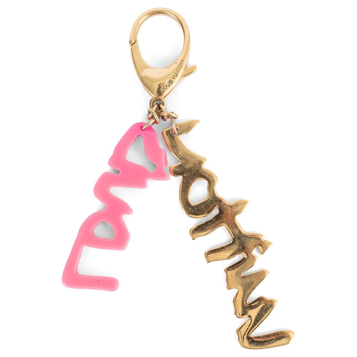 100% authentic Louis Vuitton limited edition Graffiti keyring by Stephan Sprouse in gold metall and neon pink resin. Has been worn and metal shows scratches throughout.

Measurements
Model	M65768
Width	4cm (1.6in)
Height	15.5cm