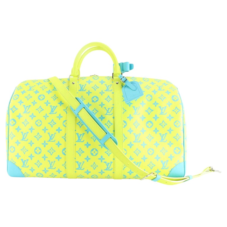 Louis Vuitton Neon Yellow Blue Monogram Playground Keepall Bandouliere  504Lk0228 For Sale at 1stDibs