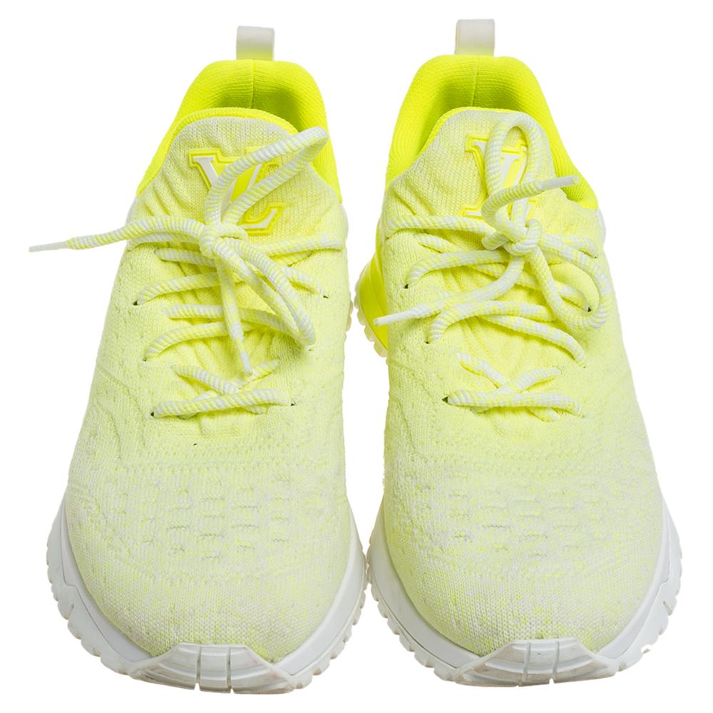 These neon yellow men's sneakers by Dolce & Gabbana are designed in a low-top profile using knit fabric. Styled with lace-ups, pull tabs, and the logo on the counters, this pair is high in comfort and style, just perfect to be worn by you.

