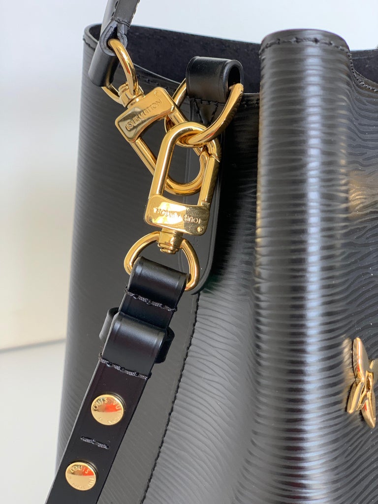 LOUIS VUITTON BLACK EPI LEATHER LOVE LOCK NEONOE BUCKET BAG DETAILS: ﻿This  limited edition bucket bag was inspired by the The Pont des…