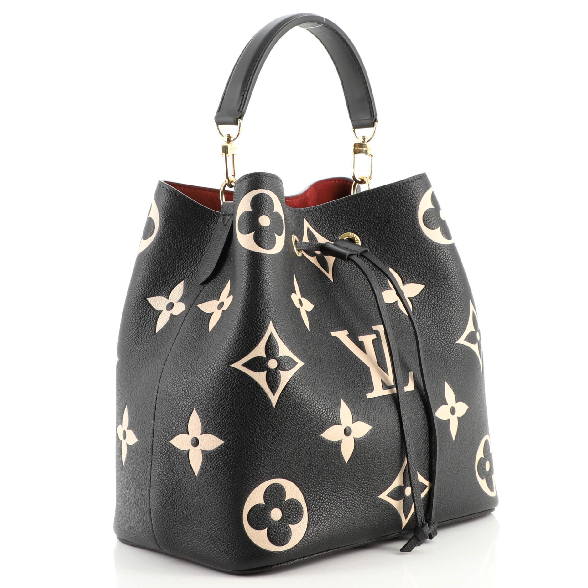 Louis Vuitton NeoNoe Handbag Bicolor Monogram Empreinte Giant MM In Good Condition In NY, NY