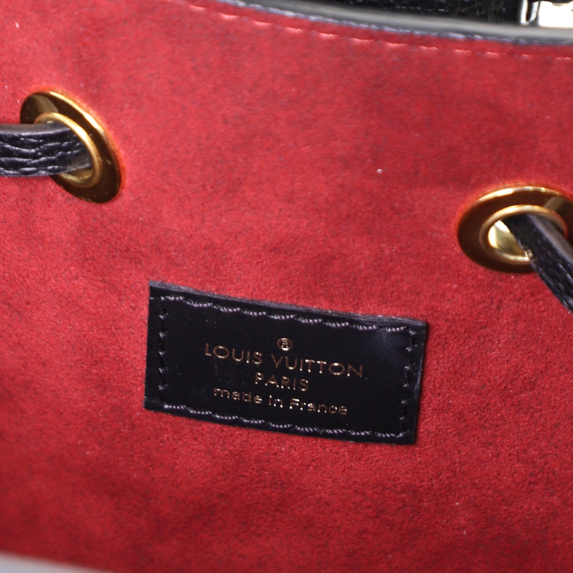 Louis Vuitton NeoNoe Handbag Bicolor Monogram Empreinte Giant MM In Good Condition In NY, NY