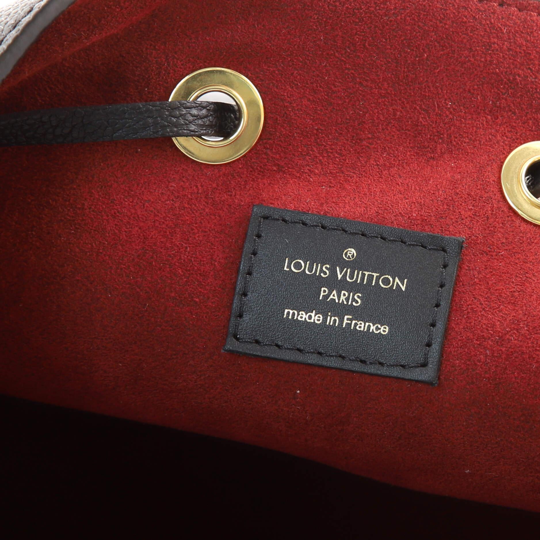 Louis Vuitton NeoNoe Handbag Bicolor Monogram Empreinte Giant MM In Good Condition In NY, NY