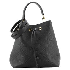 Louis Vuitton: NeoNoe Handbag Monogram Empreinte Leather MM