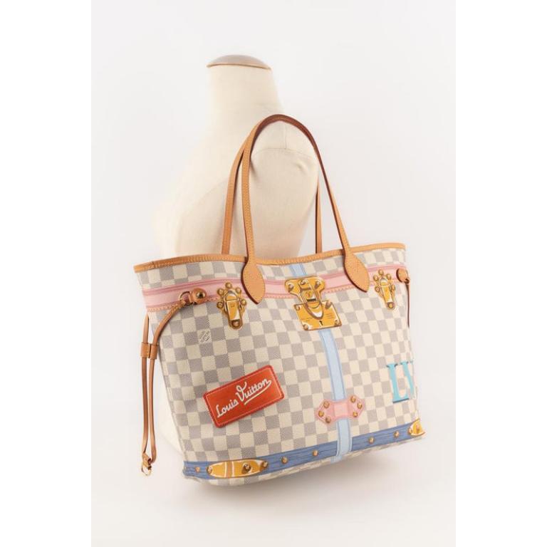Louis Vuitton - (Made in Spain) Medium-size 'Neverfull' bag made of azure Summer Trunks checked pattern canvas and natural leather. Snaplink fastening and double handle. 2018 Summer Trunks Collection.

Additional information:
Condition: Good