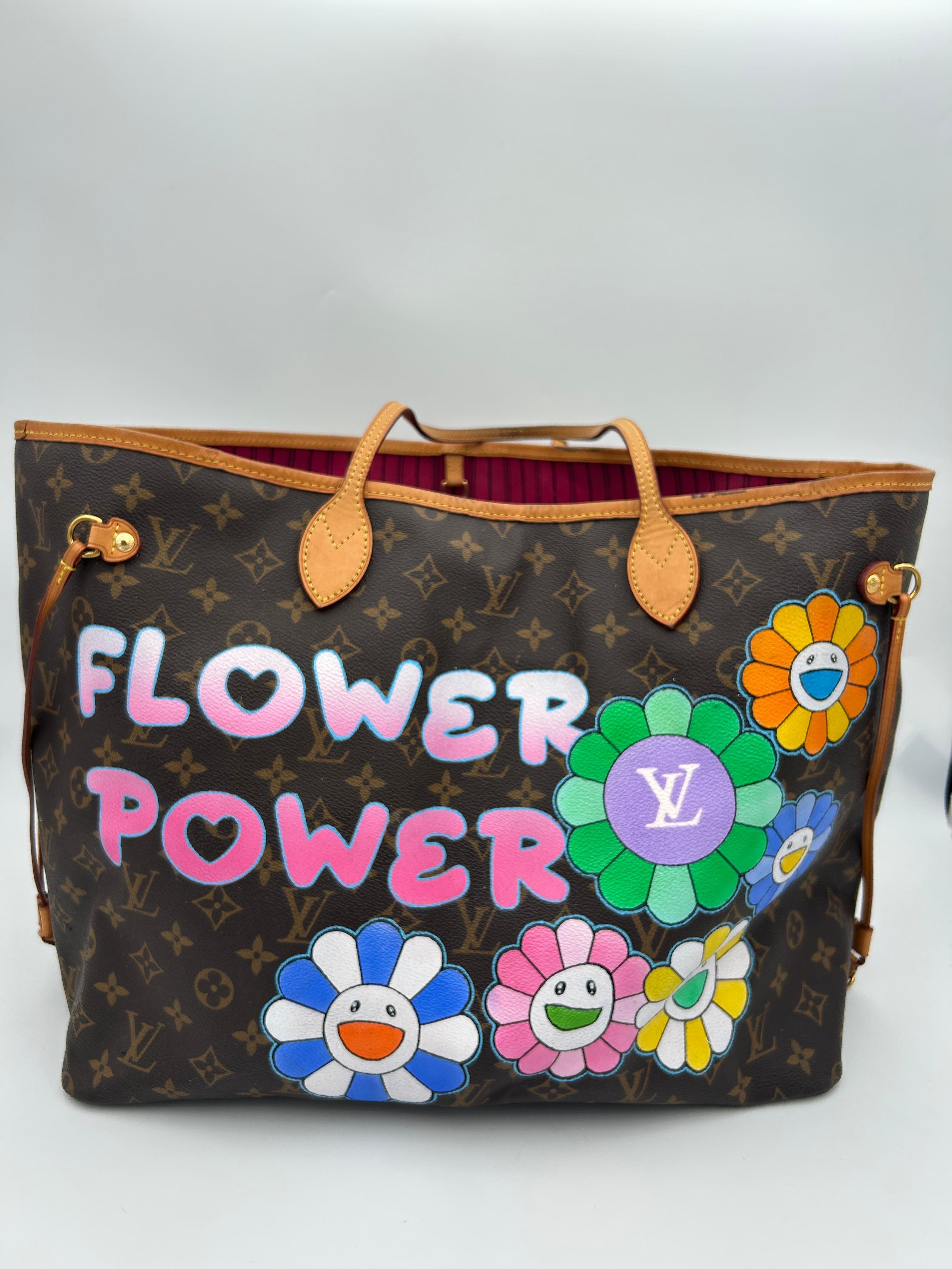 Louis Vuitton Neverfull GM Patbo. 
Please note this item is in good condition with minor wear consistent with age and use. This beautiful bag is in overall good condition, however there is some stain on the top leather lining. The laces on the sides