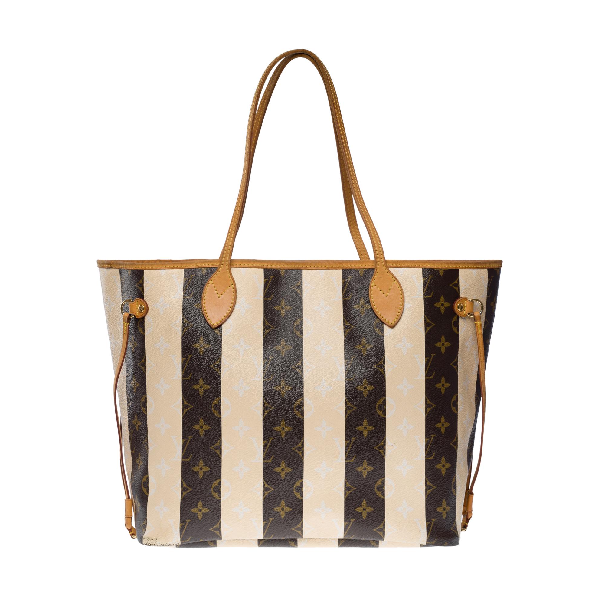 The Collector Louis Vuitton Neverfull limited edition Stripes Tote bag in brown monogram canvas and natural leather, gold metal hardware, double handle in natural leather allowing a hand or shoulder support

A snap fastener
Inner lining in striped
