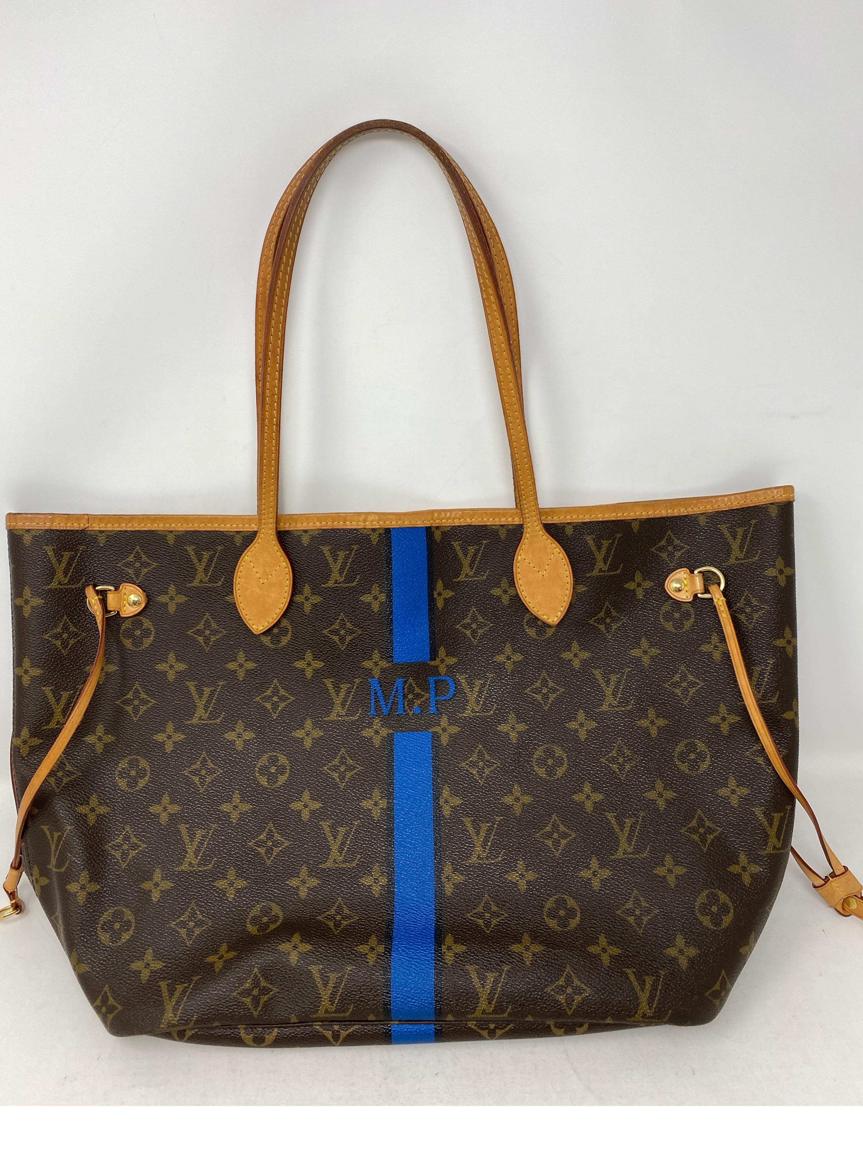 Louis Vuitton Neverfull Initial MP MM Bag. Neverfull with M.P. initials. Blue trim details. Interior blue canvas. Good condition. Guaranteed authentic. 