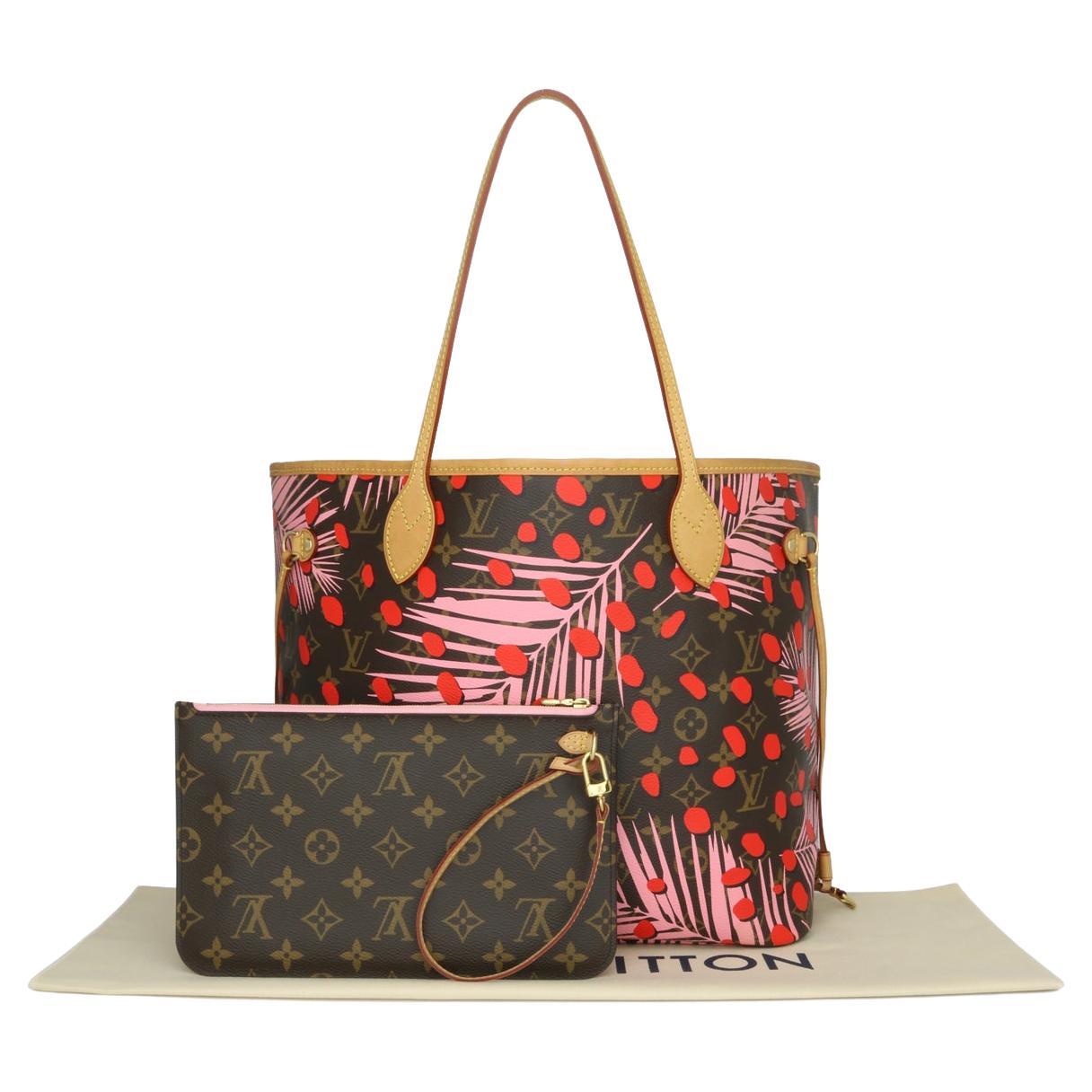 Louis Vuitton Neverfull MM Bag in Monogram Jungle Dots with Rose Ballerine Interior with Gold-Tone Hardware 2016 Limited Edition.

This bag is in very good condition.

Finding this particular style bag in excellent condition becomes extremely
